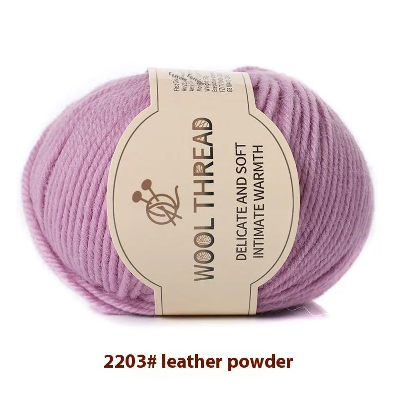 Roll of domestic wool knitting yarn for 10 needles in various colours including green, red, and blue