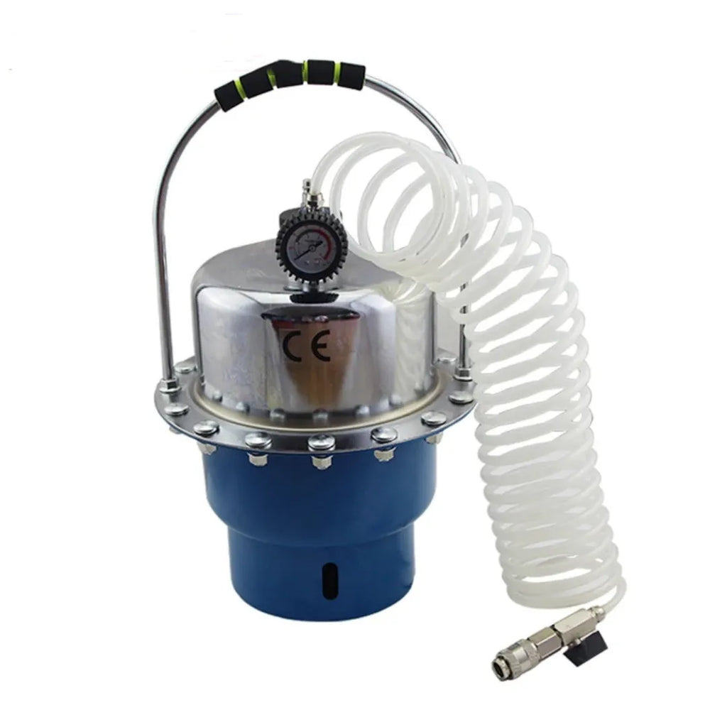Pneumatic brake fluid replacement tool with 5L tank, pressure gauge, adapter kit, collection bottle, and fluid hose on a workbench