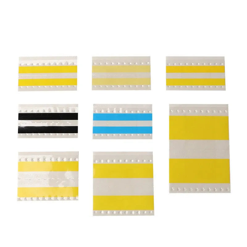 Rolls of yellow double-sided splicing tape for placement machines in various widths on a industrial background.