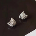 Geometric zircon earrings with platinum electroplated finish and clean line design