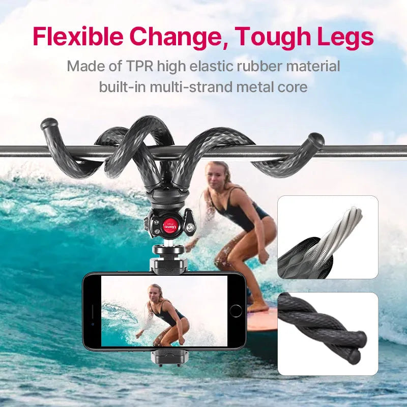 Black octopus leg mobile phone tripod with clip, extended to 360mm on a table.