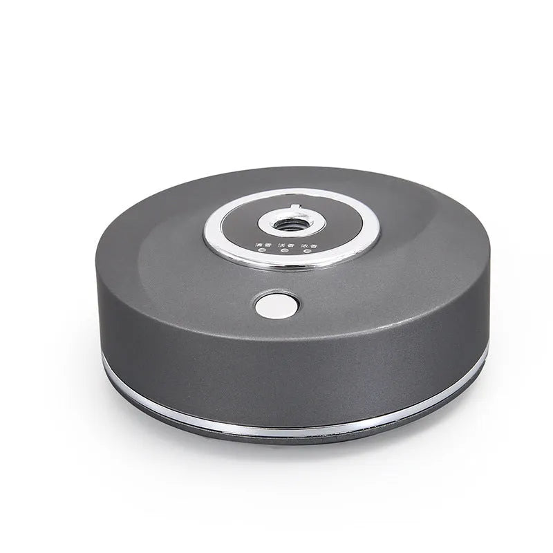 USB car diffuser with anti-slip pad in black plastic on vehicle dashboard