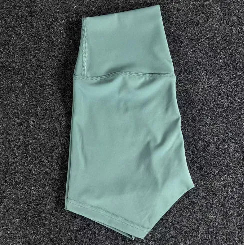 Ladies high waist yoga shorts in nylon fabric, shown in multiple colour options.