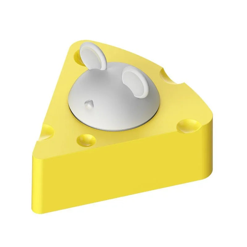 Yellow cheese-shaped cat toy ball with textured surface for teeth cleaning, filled with catnip and silvervine.