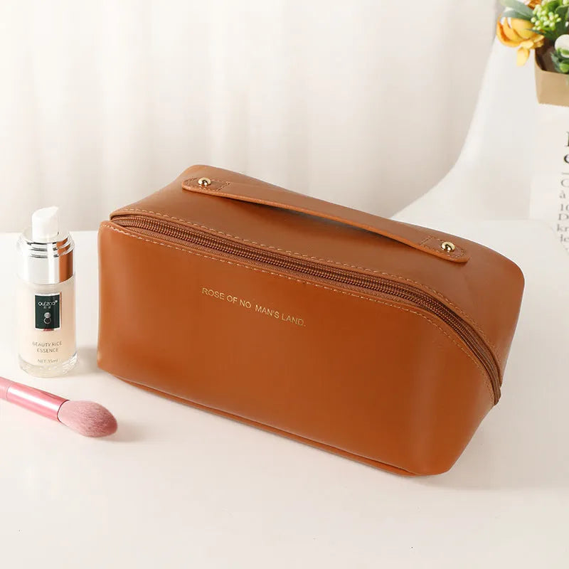 Korean style PVC waterproof pillow cosmetic bag in milky white with letter print pattern