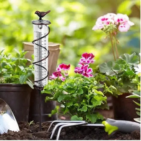 Cast iron and glass rain gauge with hummingbird design for garden rainfall measurement