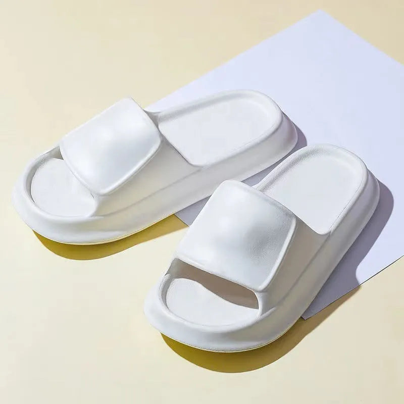 A pair of thick-soled EVA foam flip-flop slippers in a choice of seven colours on a plain background.