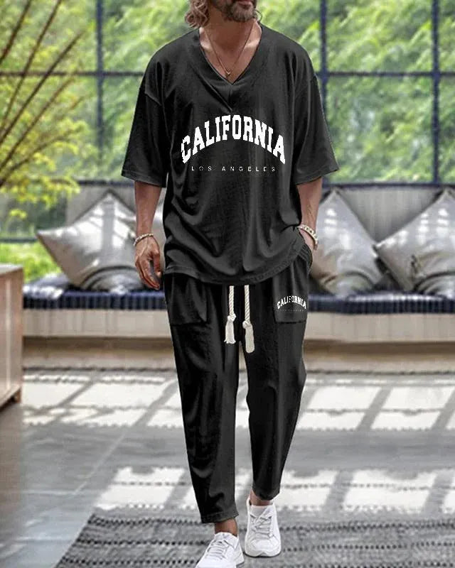 Cropped sleeve V-neck jacket and matching trousers in polyester fabric