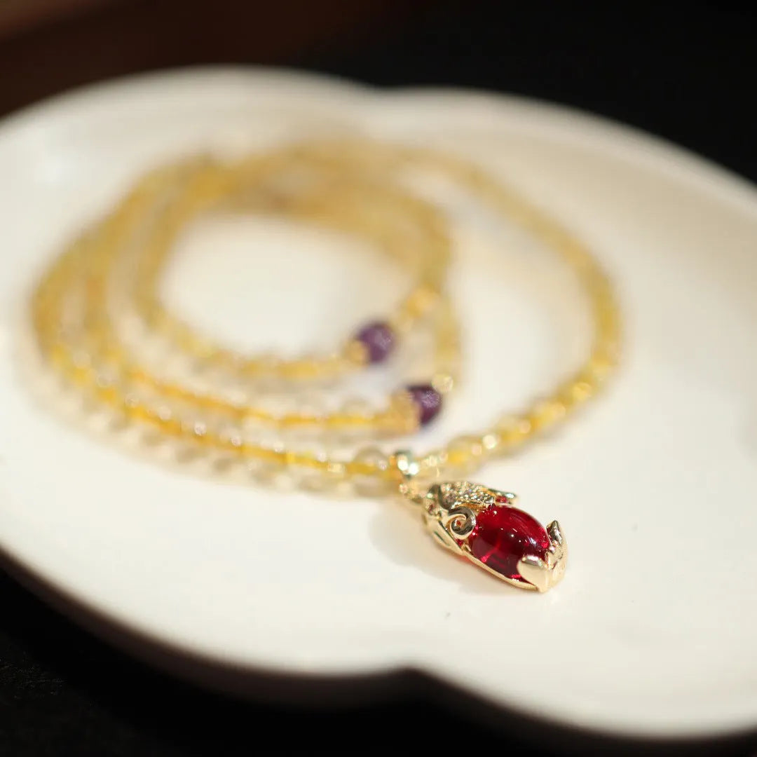 Natural Brazilian gold rutilated quartz bracelet with three circles and hanging chopsticks design
