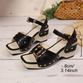 Women's white chunky heel sandals with metal buckle and square toe on a rubber platform sole.