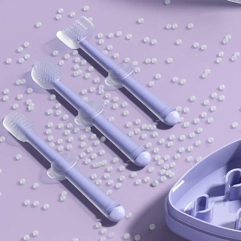 Silicone pet toothbrush for cats and dogs in blue, green, and purple colours for dental care.