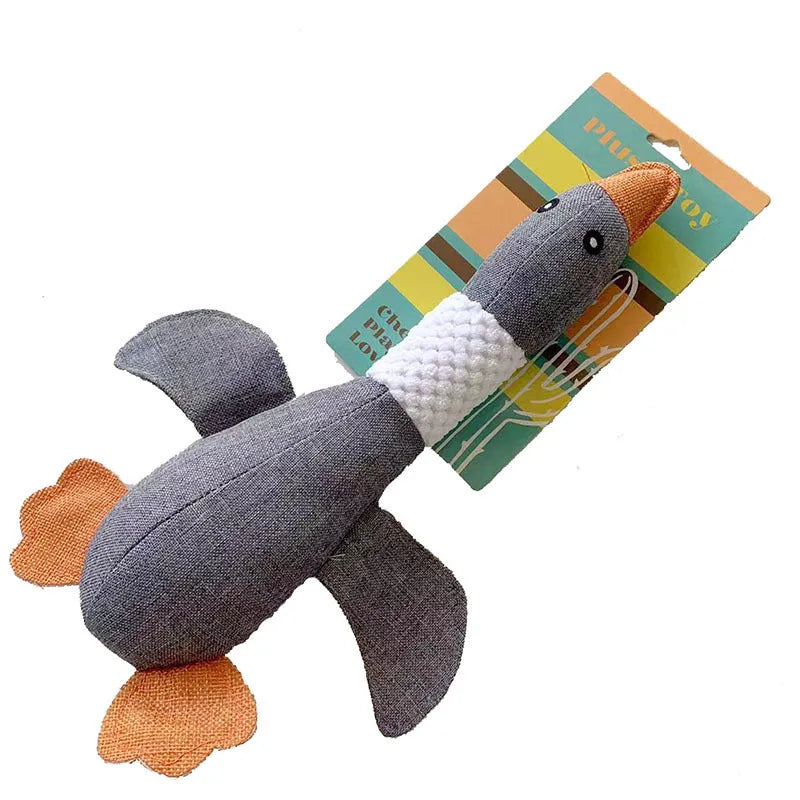Blue green or grey durable plush duck dog toy with squeaker for chewing and play.