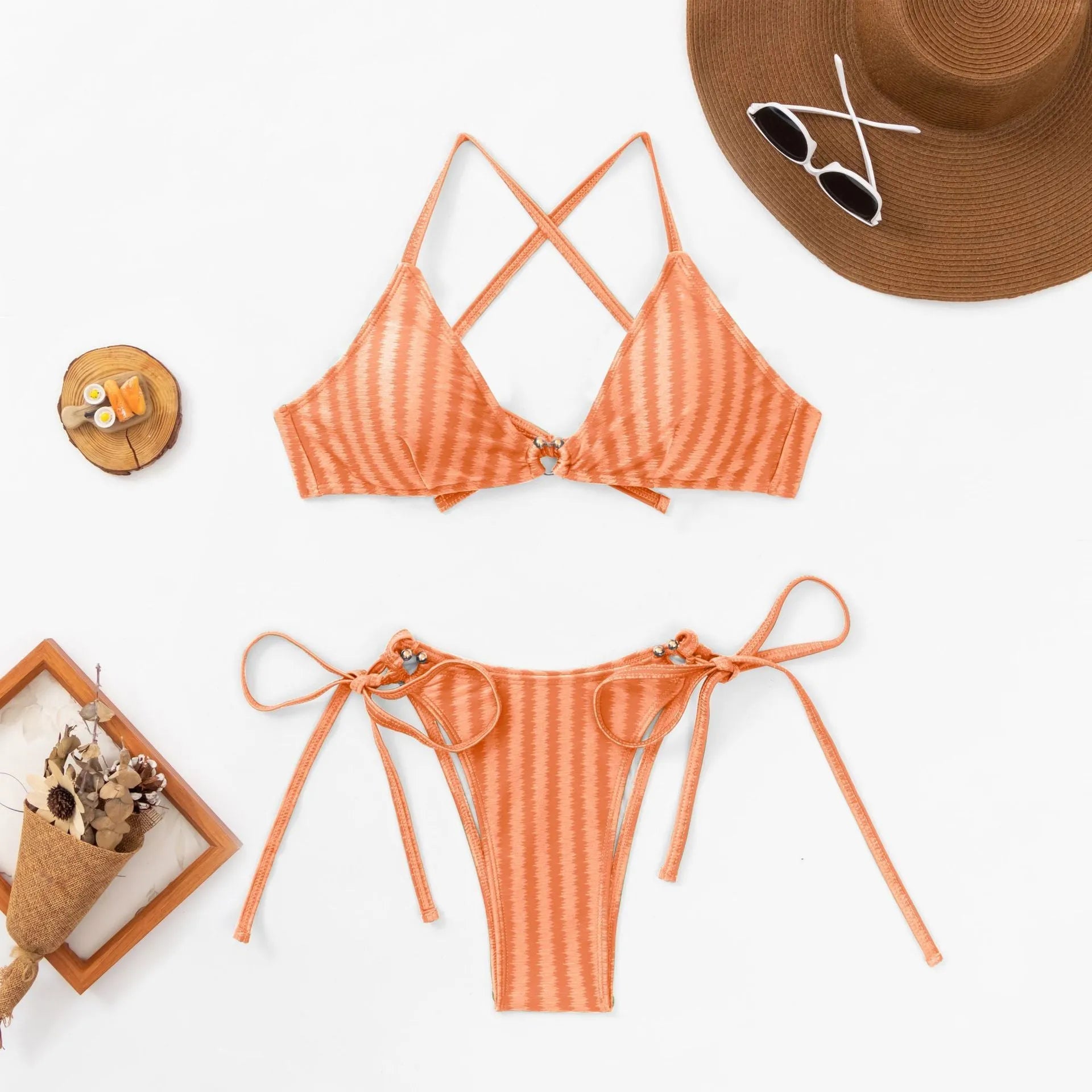Women's red jacquard lace-up bikini set with backless top and split briefs.