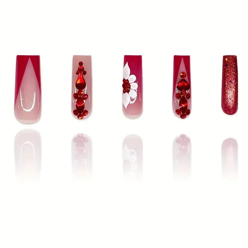 Floral press-on fake nails with prismatic red diamond accents in European square long shape