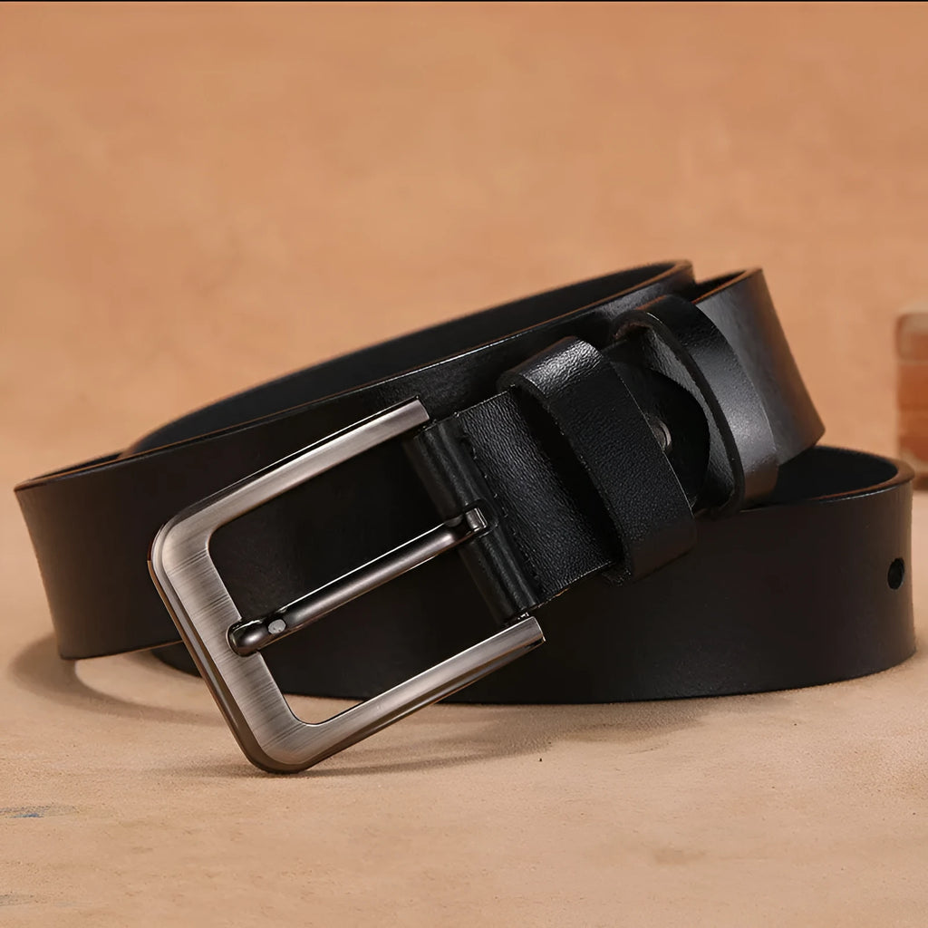 Square head pin buckle jeans strap belt in black with alloy buckle on a size label
