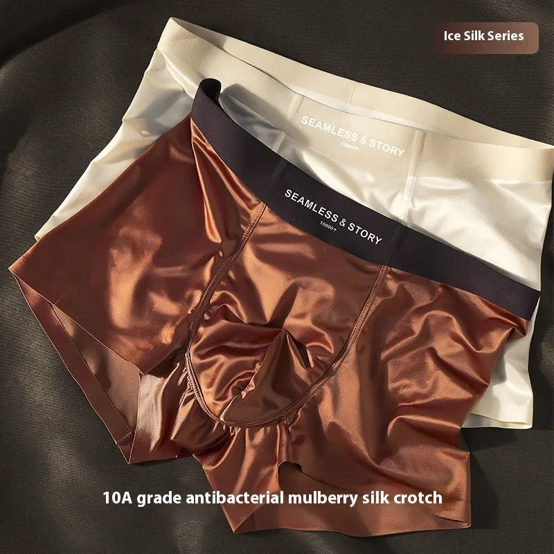 Men's solid colour ice silk briefs on a mid-waist mannequin, showing coffee, grey, white, and blue options.