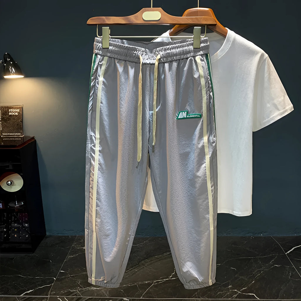 Men's black cotton harem pants with mid waist design and standard trousers length