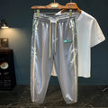 Men's black cotton harem pants with mid waist design and standard trousers length