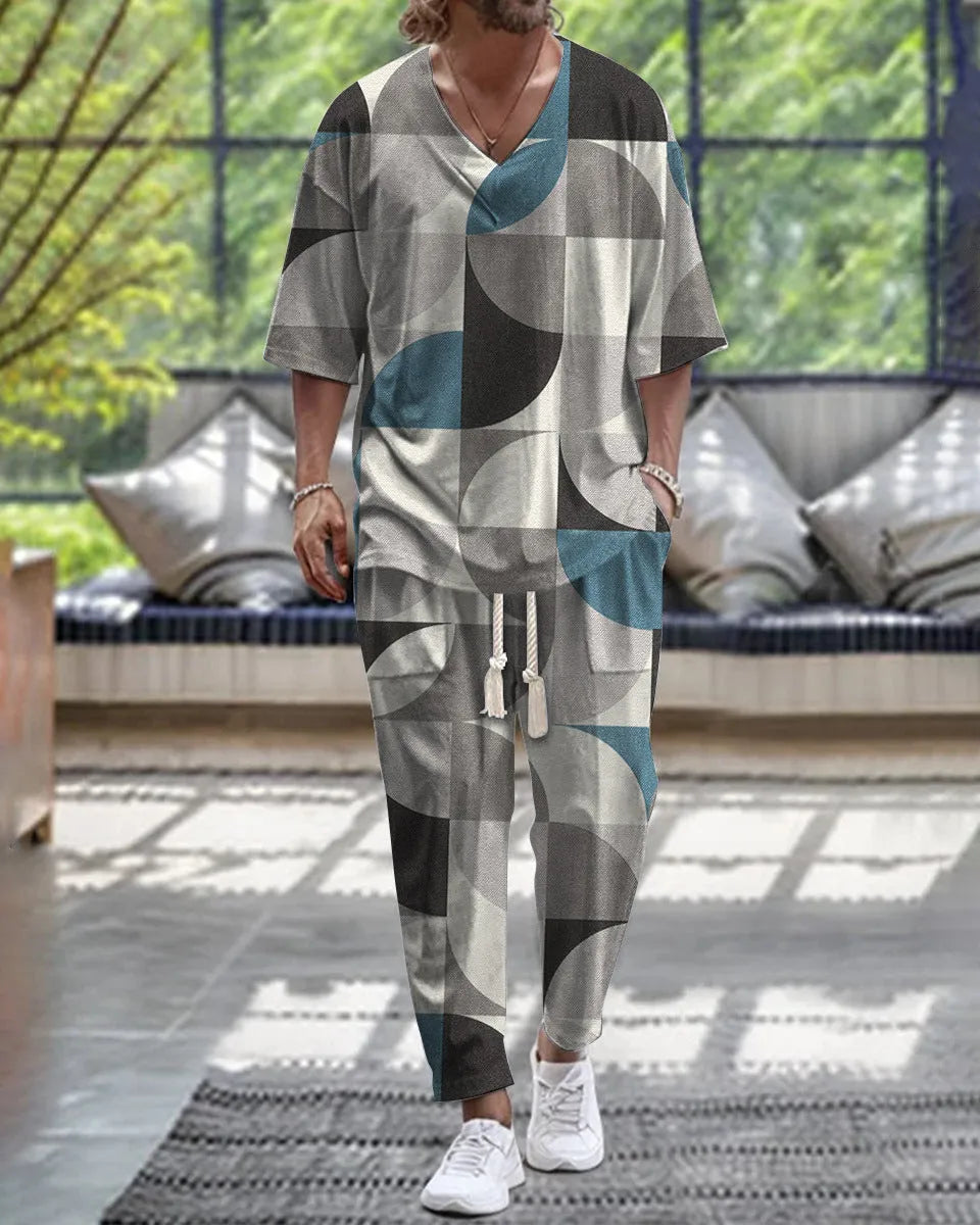 Cropped sleeve V-neck jacket and matching trousers in polyester fabric