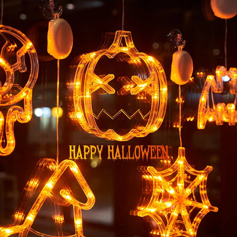 Halloween window hanging LED lights with spider, pumpkin and ghost designs on suction cups