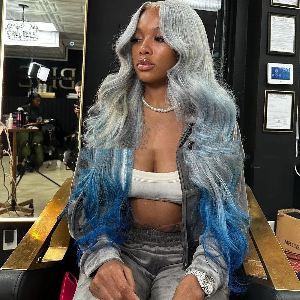 Grey to blue gradient human hair lace front topper on a wig stand.