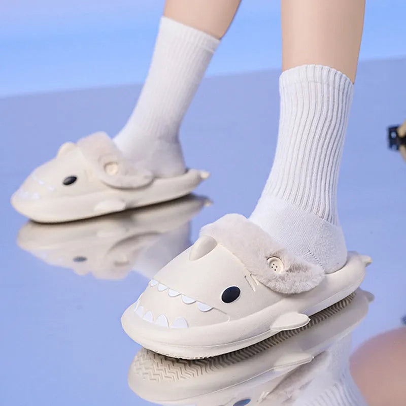 Winter shark button EVA house slippers in haze blue with sewing thread detail on indoor floor