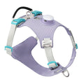 A light purple adjustable nylon dog harness with an LED light on the chest strap.