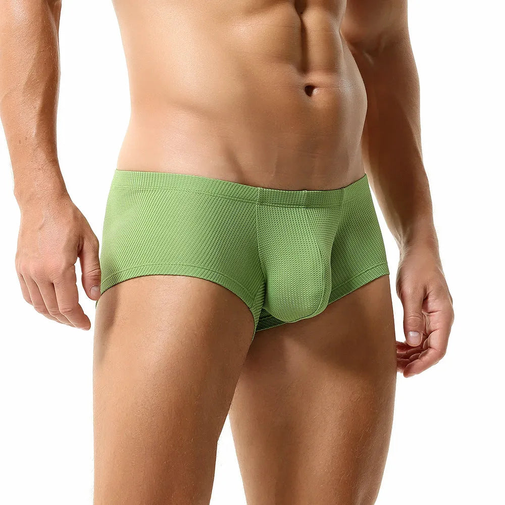 Personality men's nylon boxers in solid colours showing low waist design.