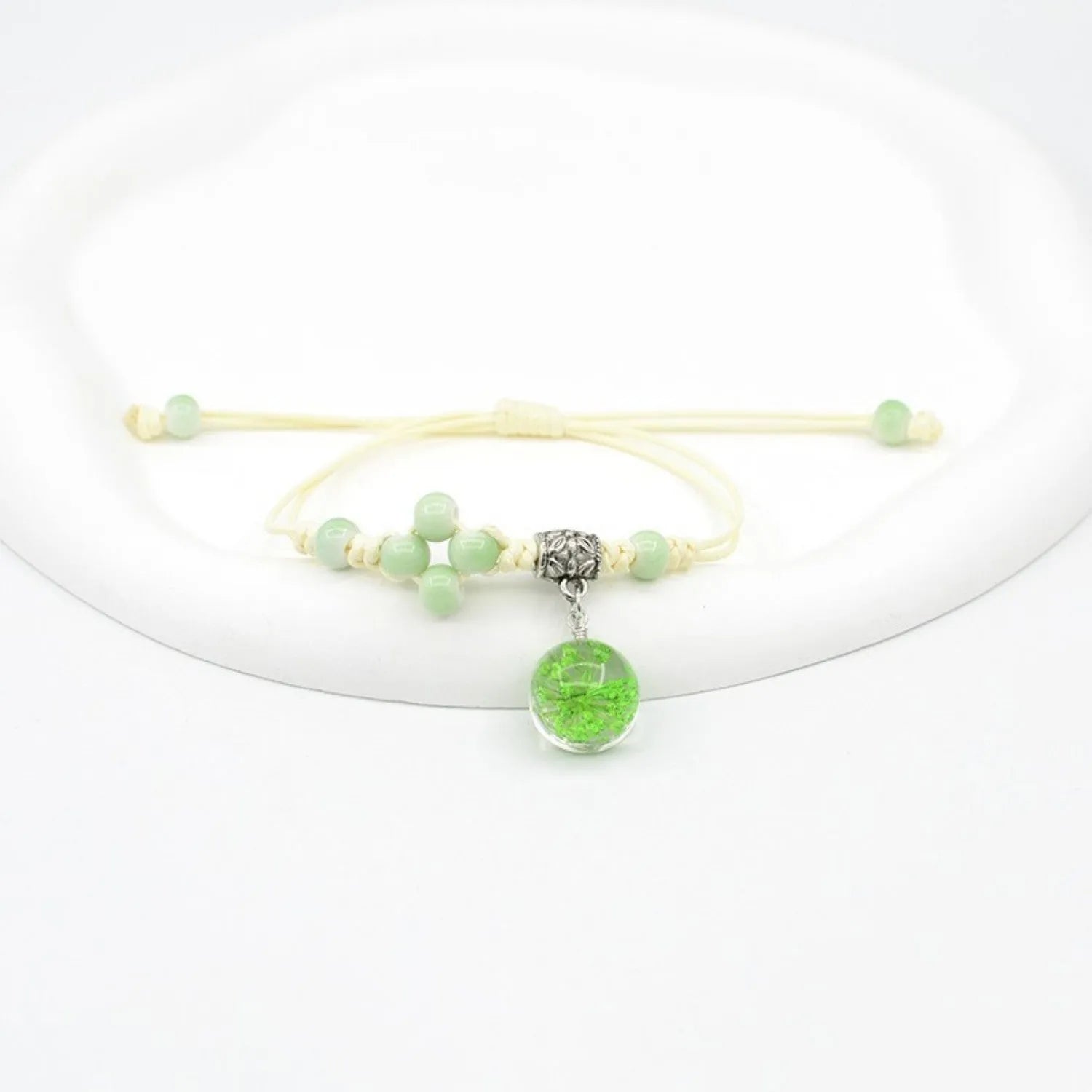 Glass bracelet with dried flowers inside 1.4cm beads on lace-style band in multiple colour options