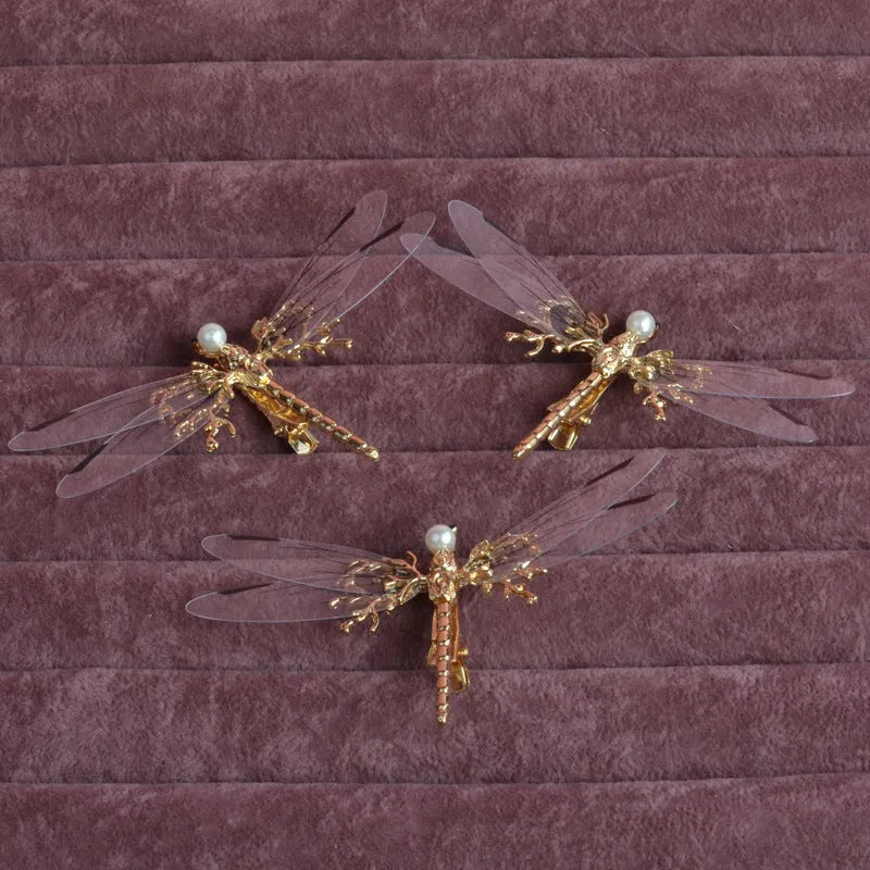 Gold dragonfly side clip headdress with detailed alloy construction and electroplated finish