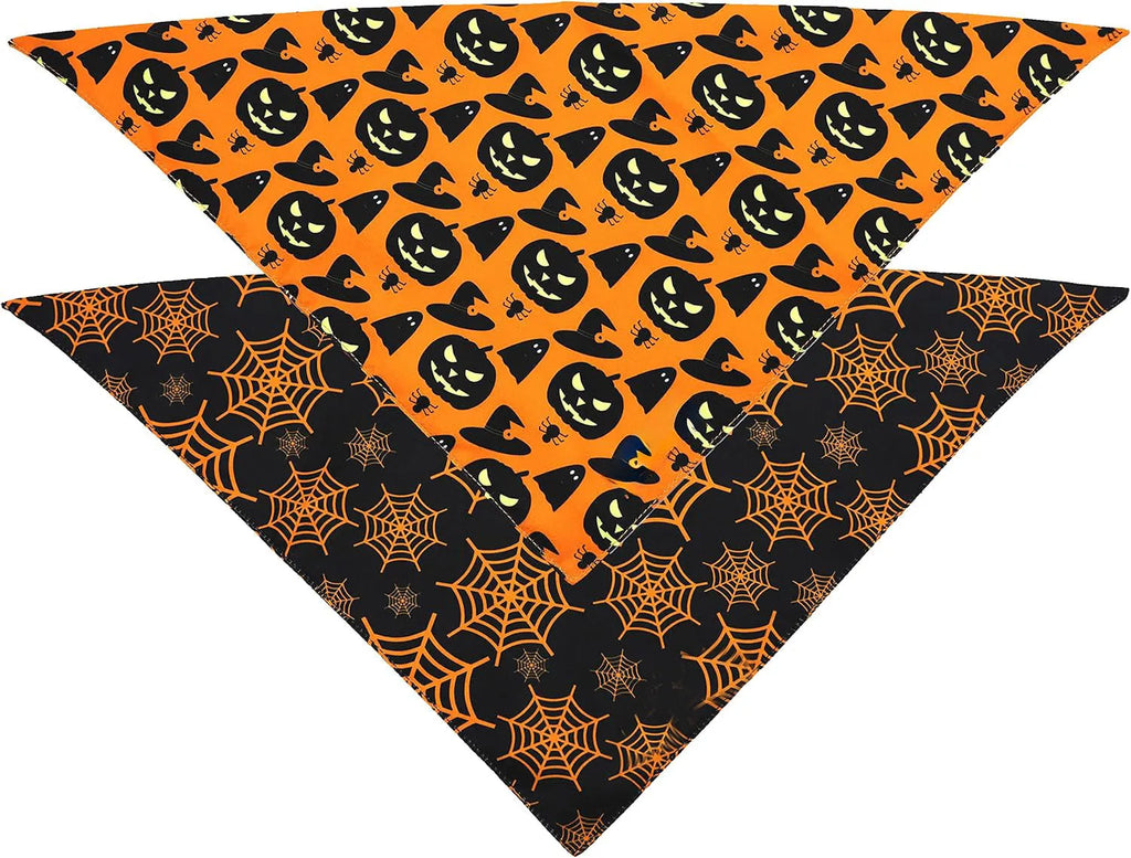 Reversible Halloween dog bandana with pumpkin and spider web designs in black and orange colours