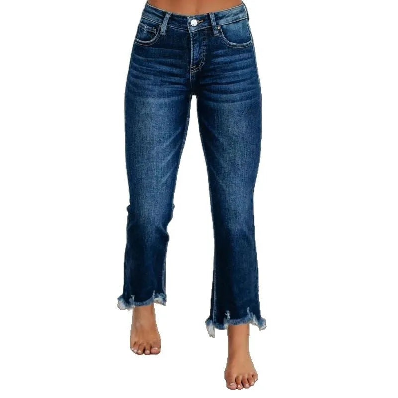 Women's solid blue denim trousers with a casual, hand-worn finish on a hanger.