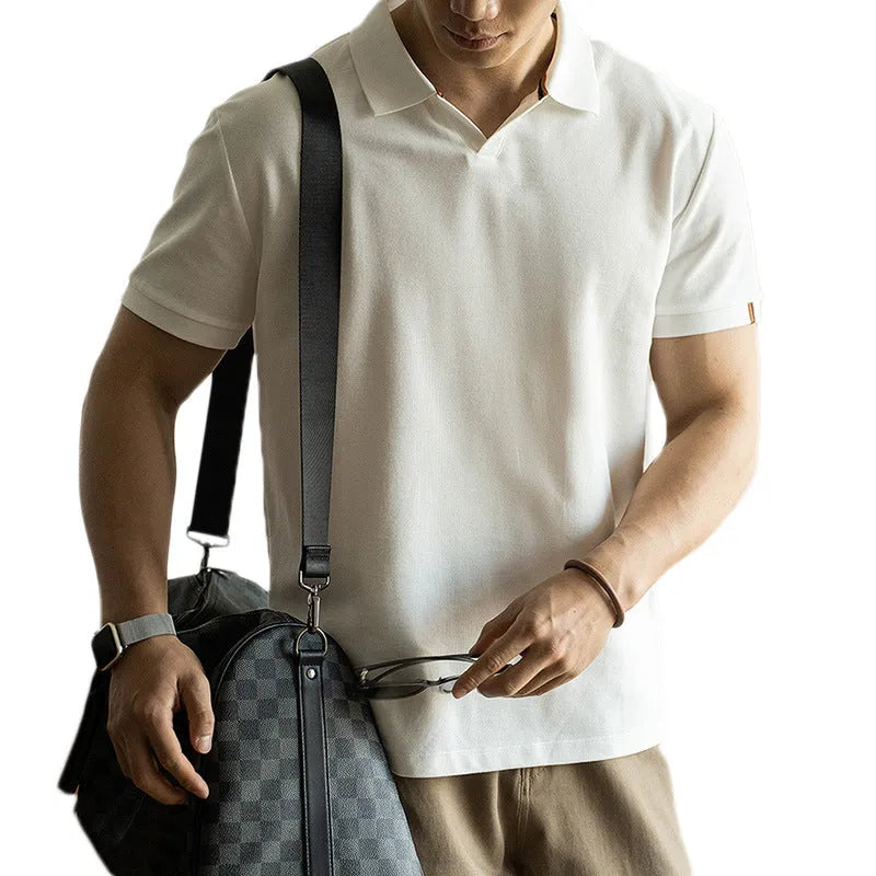 American-style short-sleeved polo shirt in a blue cotton-polyester blend on a hanger.