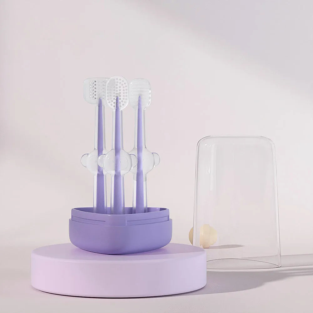 Silicone pet toothbrush for cats and dogs in blue, green, and purple colours for dental care.