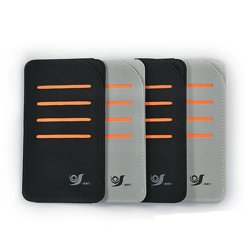 Set of four grey car sun visor card holder tablets next to a vehicle-mounted storage bag.