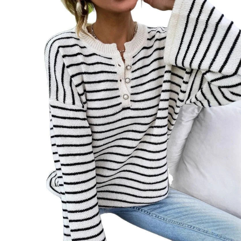 Black women's striped long sleeve top with drop-shoulder sleeves and contrast colour details