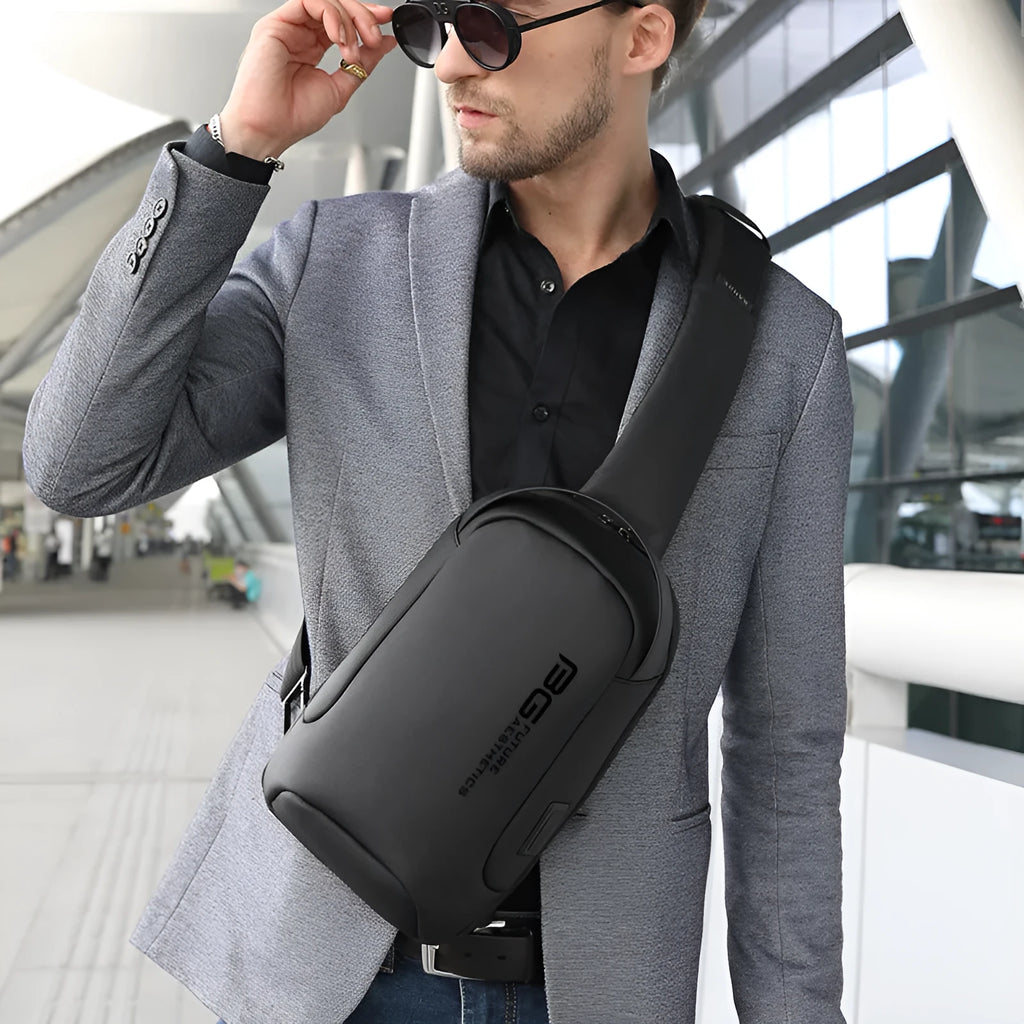 Men's casual Oxford cloth shoulder bag with USB charging port in four colour options.