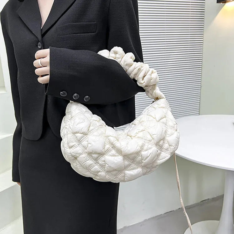 Women's nylon messenger bag in a solid colour with adjustable shoulder strap showing 35cm width.