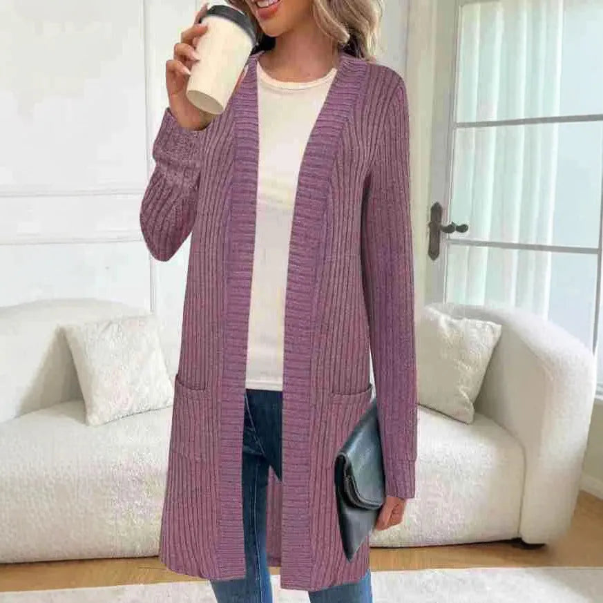 Loose long sleeve knitted cardigan jacket in black with side pockets.