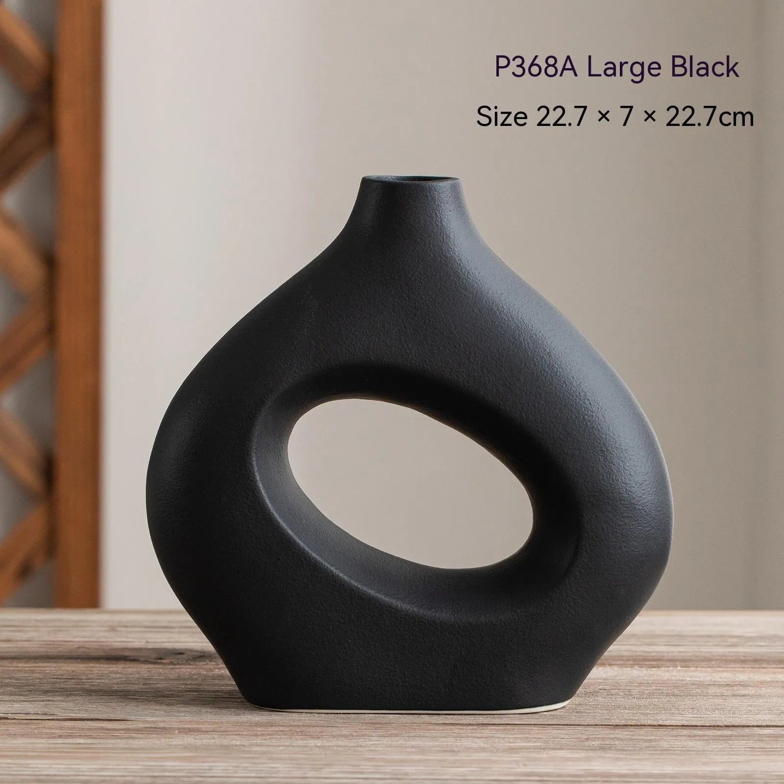 Ceramic circle vase second generation with coloured glaze finish, white large size, on a plain background
