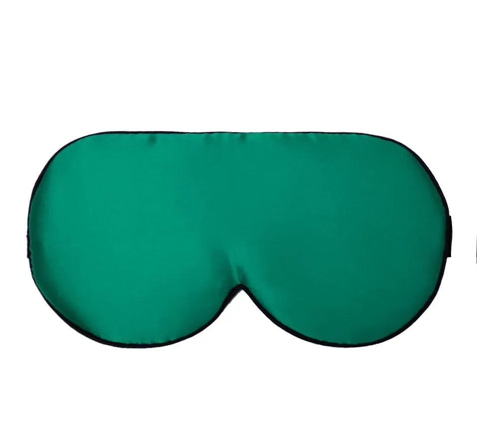Double-sided mulberry silk eye mask in champagne colour with embroidered print.