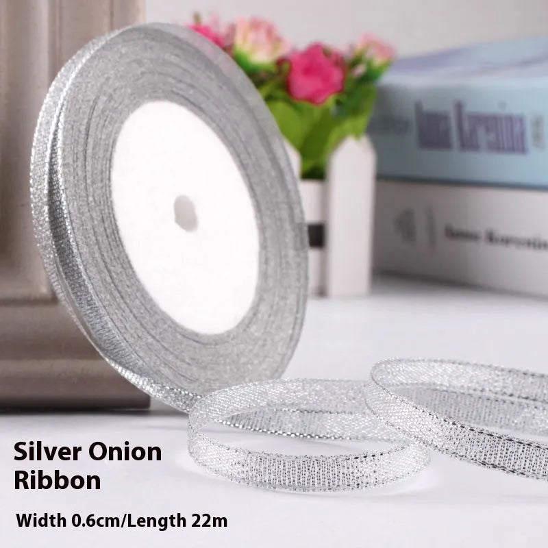 Roll of narrow 0.6cm wide polyester decorative ribbon in multiple colour options including metallic finishes