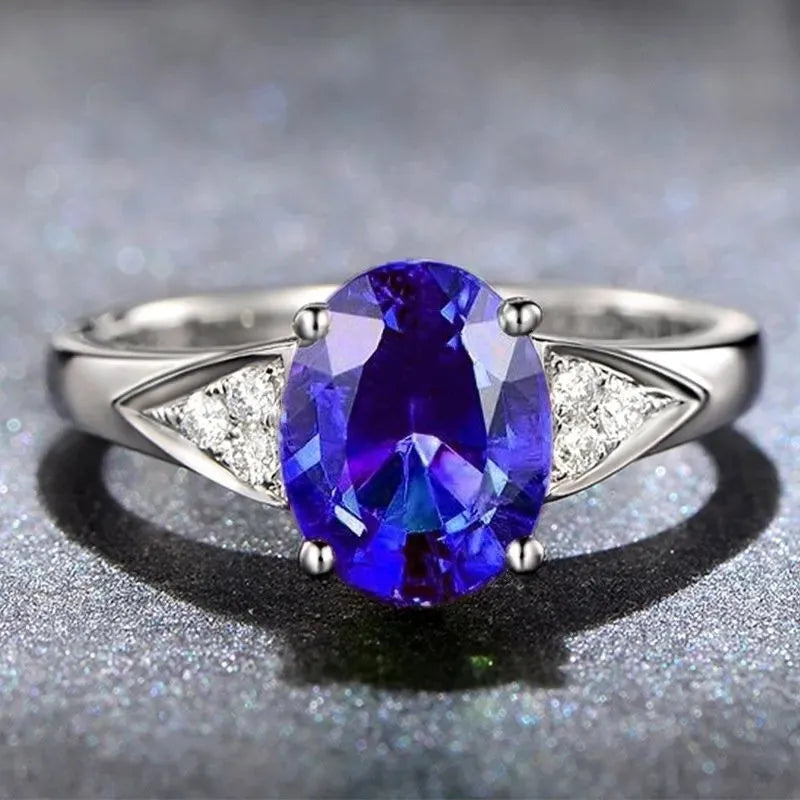 Ladies natural zircon ring with heart, water drop, or bell pattern in court setting, red or blue stone