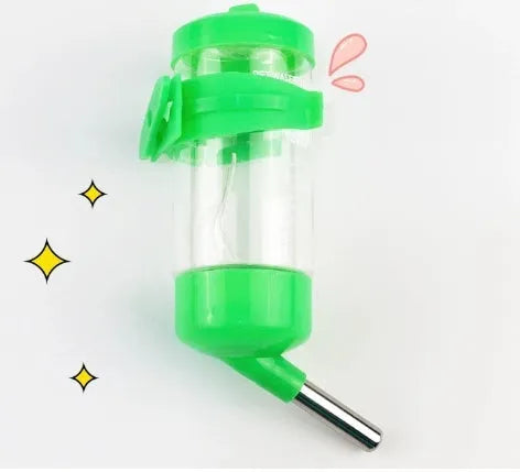 Green plastic ball kettle pet water feeder with a glass tube attached to a cage.