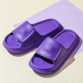 A pair of thick-soled EVA foam flip-flop slippers in a choice of seven colours on a plain background.