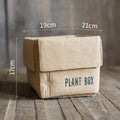 Cement flowerpot with bottom drainage holes and paper box texture in Nordic style design