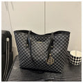 Women's structured PU leather shoulder bag with street trend sewing details shown in neutral colour options