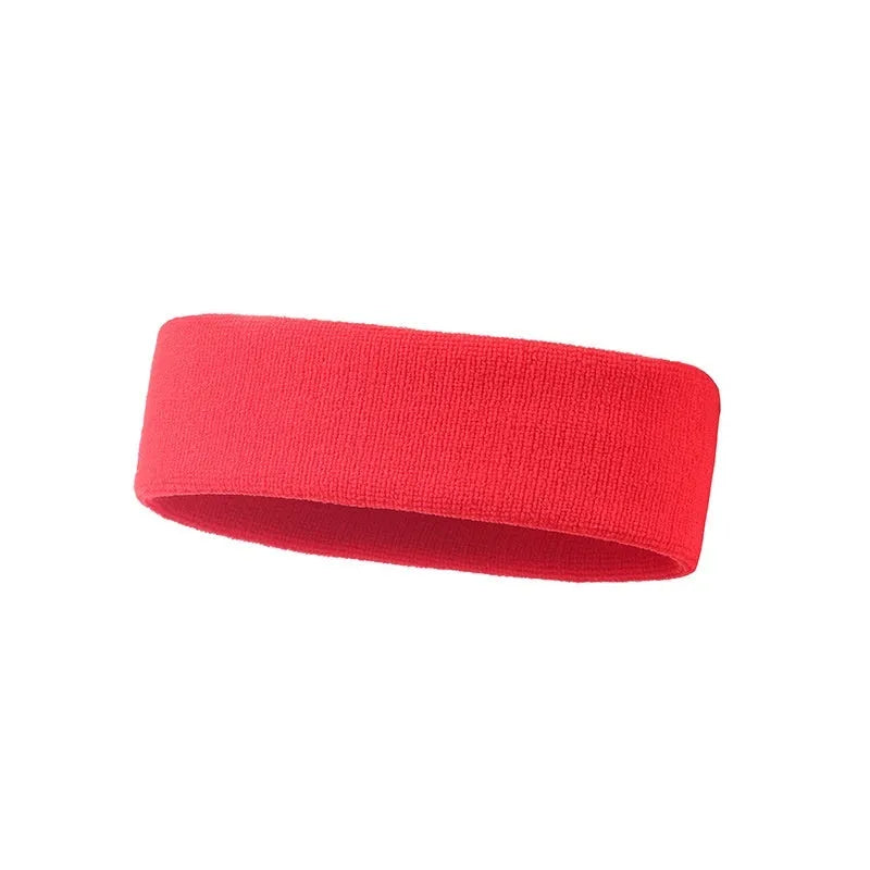 Elastic solid colour sports sweatband in black, shown stretched to demonstrate fit.