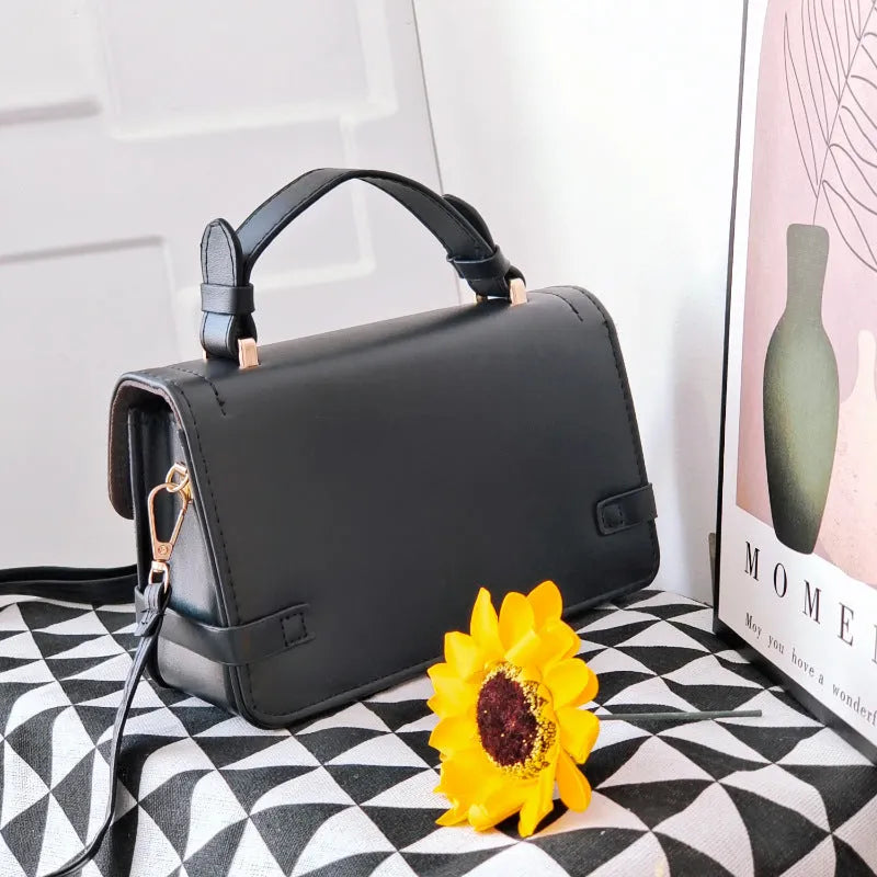 Retro patterned women's crossbody bag in a horizontal rectangle shape, shown in apricot colour.