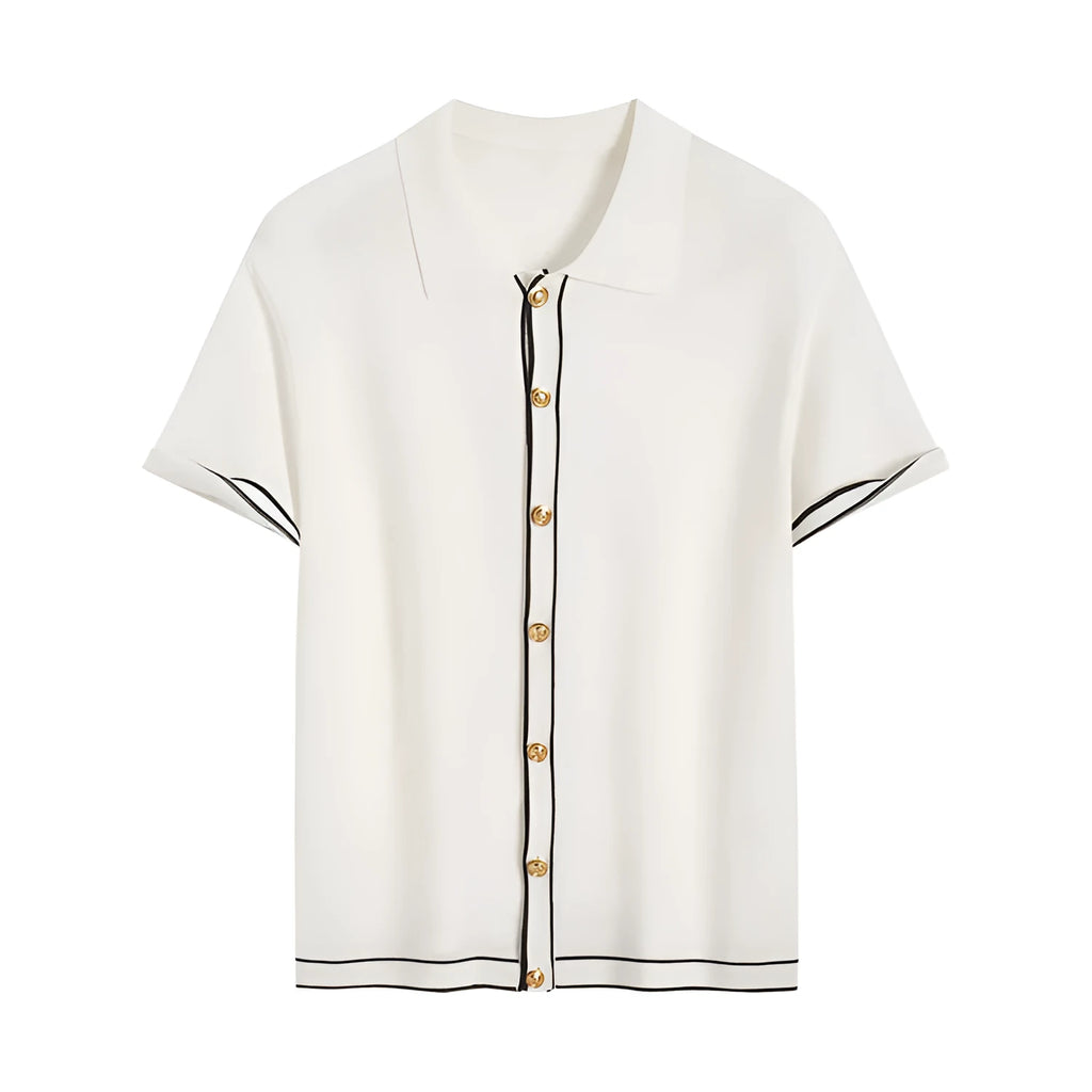 White short sleeve cardigan with dark contrast lapels on a hanger.